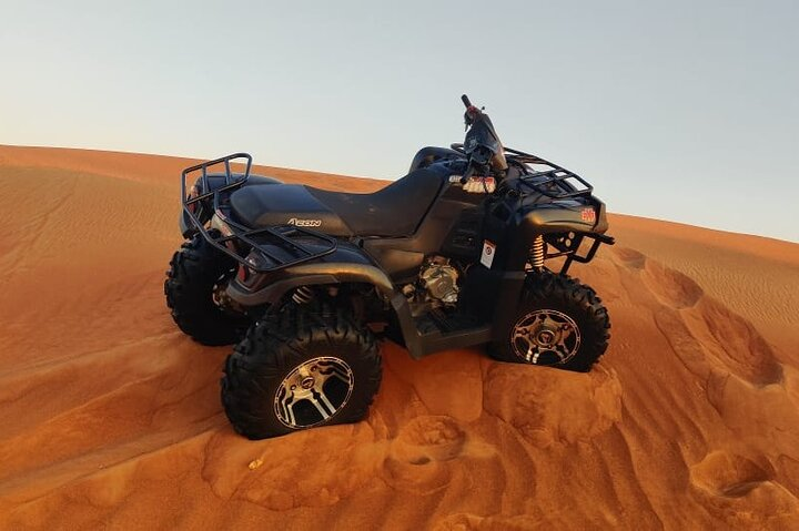 Explore the vast desert sands on an ATV capturing unforgettable moments as you glide through dunes and experience traditional Bedouin culture complete with delicious Arabic cuisine under the stars.
